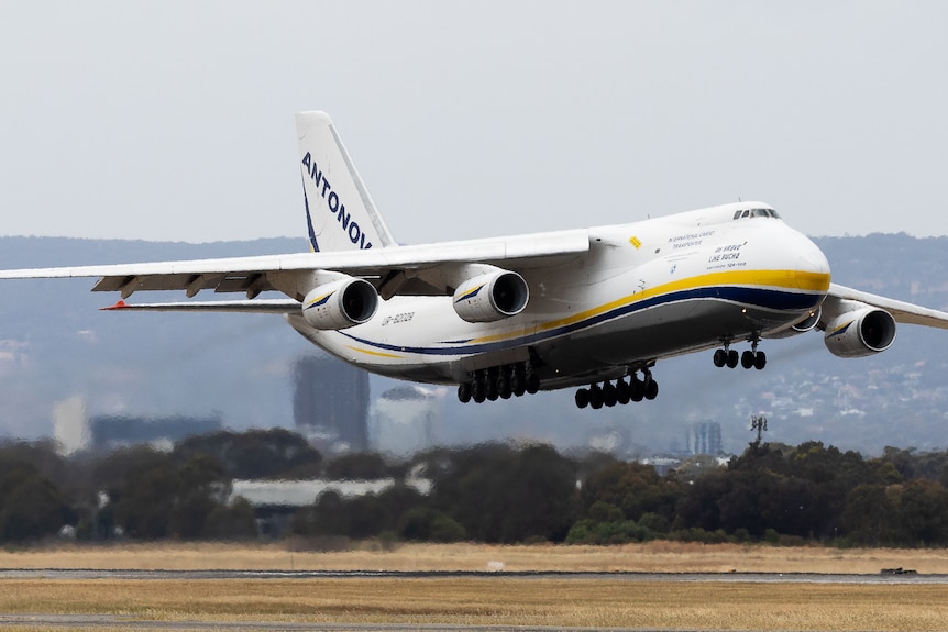 A large aeroplane takes off from an airport
