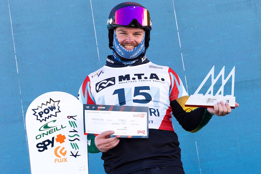 Adam Lambert on the podium after finishing second in the snowboard cross event in Georgia