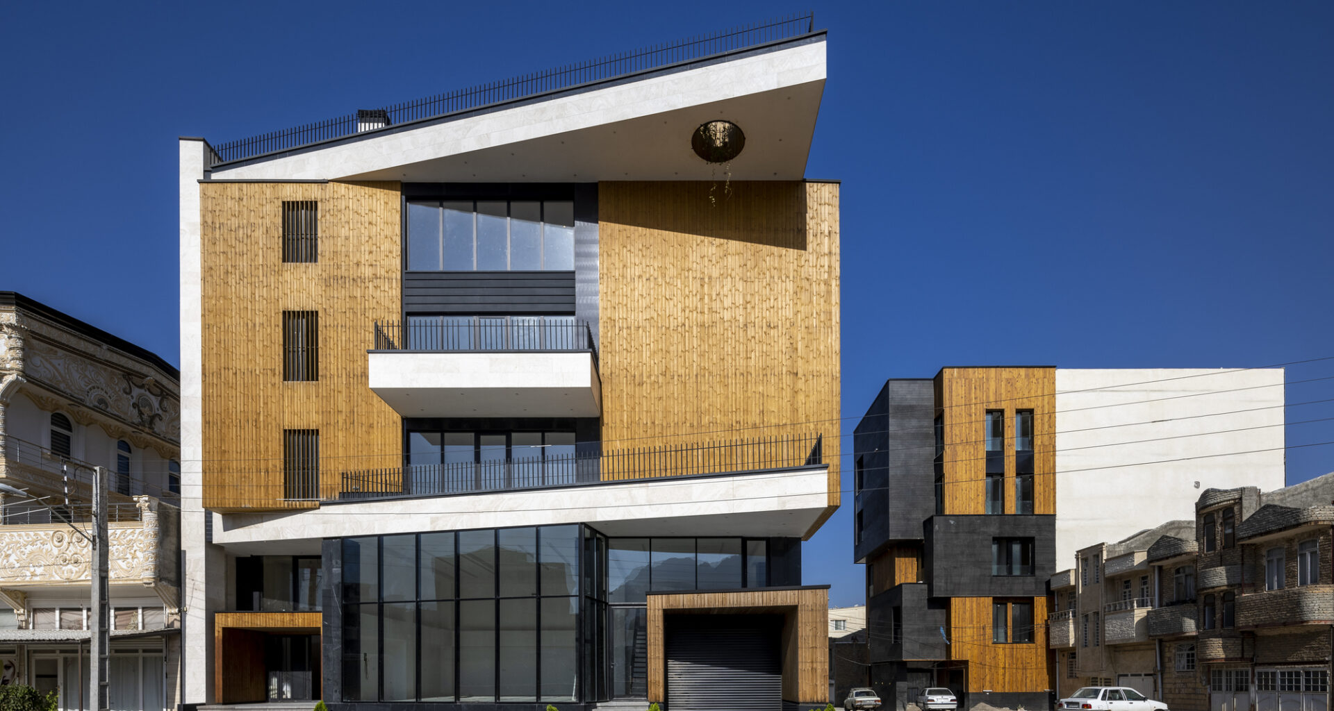 Ramand Mixed-Use building / White Cube Atelier