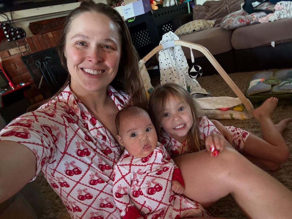 photo of ronda rousey with her two daughters