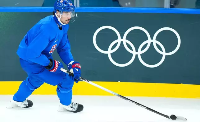 United States forward Auston Matthews takes part in a men's ice hockey practice during the 2026 Winter Olympics in Milan, Italy, Sunday, Feb. 8, 2026. (Nathan Denette/The Canadian Press via AP)
