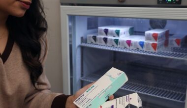 A woman uses a Mounjaro injection pen on October 4, 2025 in Cardiff, Wales.