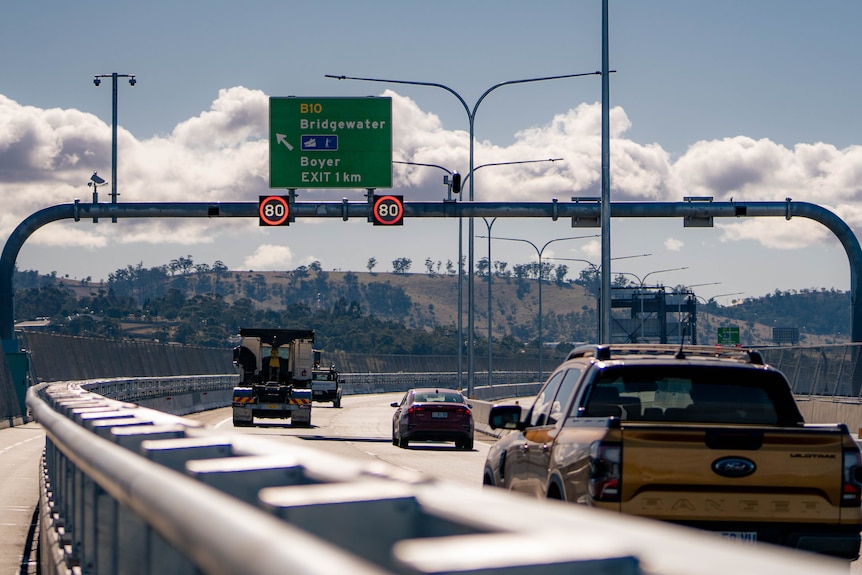 Cars driving over a bridge