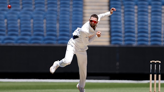 Matt Short bowls during day four of the Sheffield Shield match between Victoria and Western Australia.