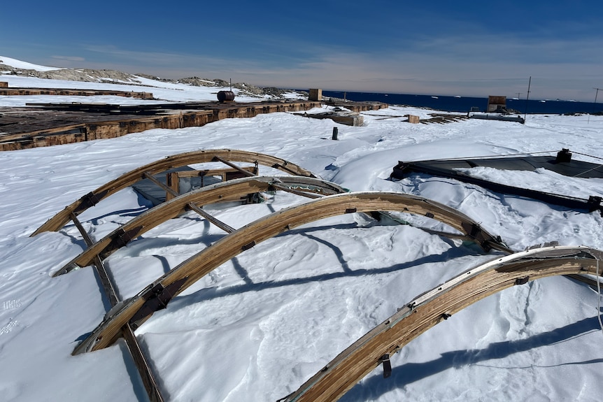 Images of an abandoned station in the icy and snowy Antarctic wilderness.