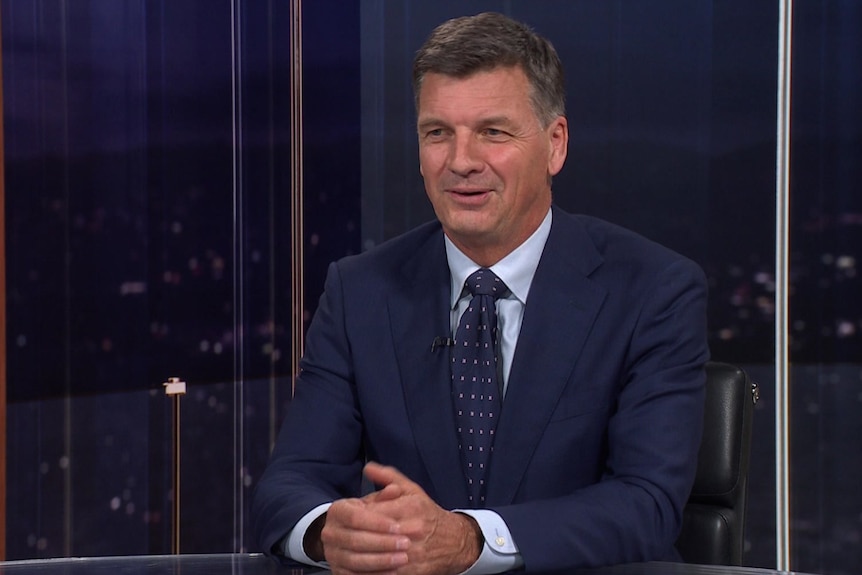 A man wearing a suit and tie.