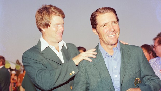 Tom Watson presents Gary Player with a Green Jacket after the 1978 Masters Tournament at Augusta National Golf Club on April 9, 1978 in Augusta, Georgia. (Photo by Augusta National/Getty Images)
