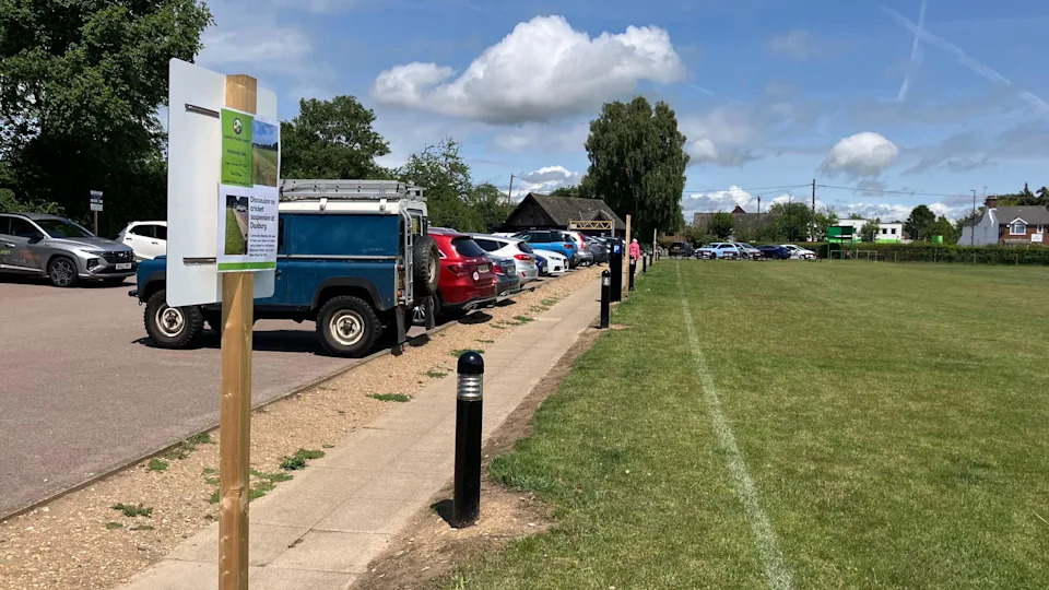 A general view of the edge of the cricket field's boundary at Dawson Fields and the adjacent public car park.
