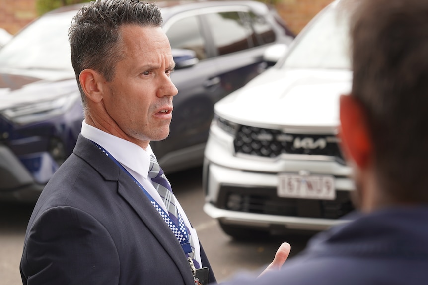 A side view of detective inspector Michael Manago speaking.