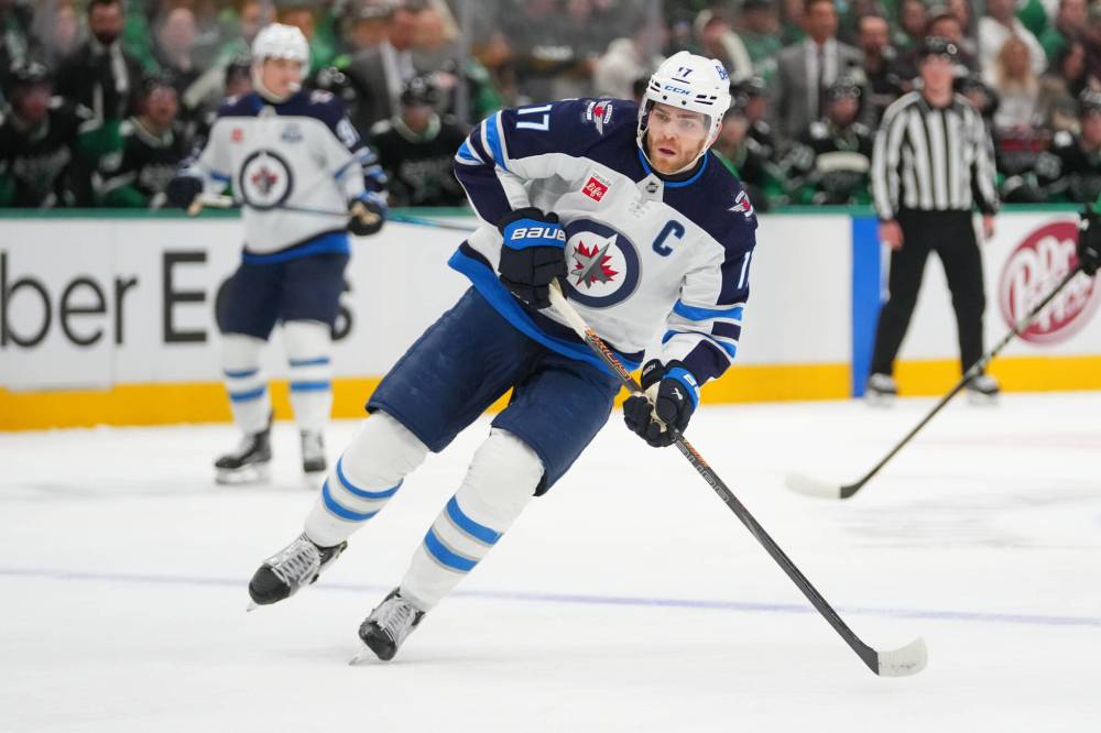 JULIO CORTEZ / THE ASSOCIATED PRESS FILES
Winnipeg Jets captain Adam Lowry said Tuesday he’s happy the Olympics get to showcase ‘so many great players from so many countries.’