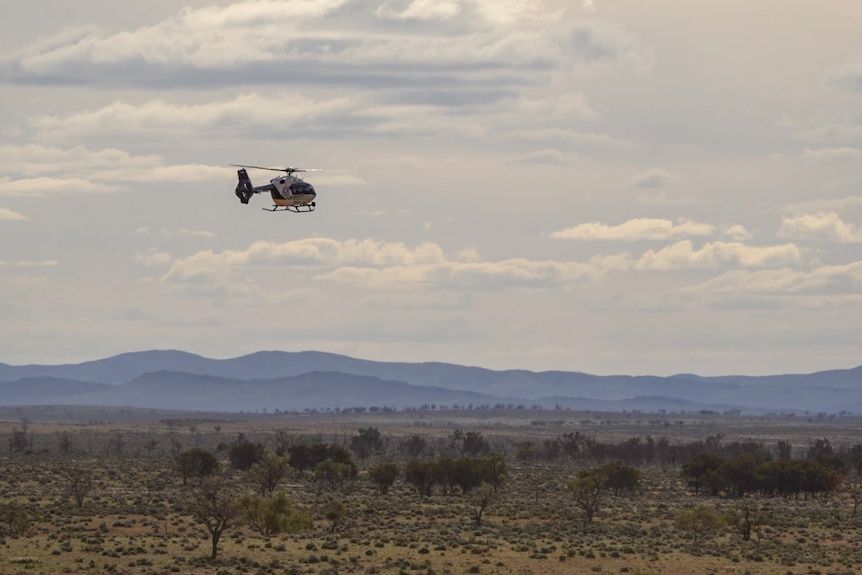 A search in outback terrain.