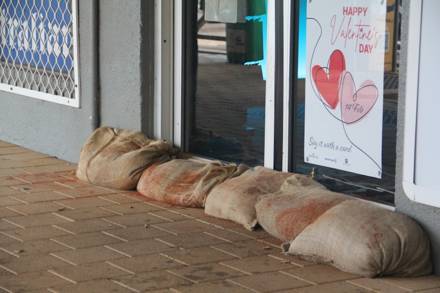 Sandbags in front of doors.