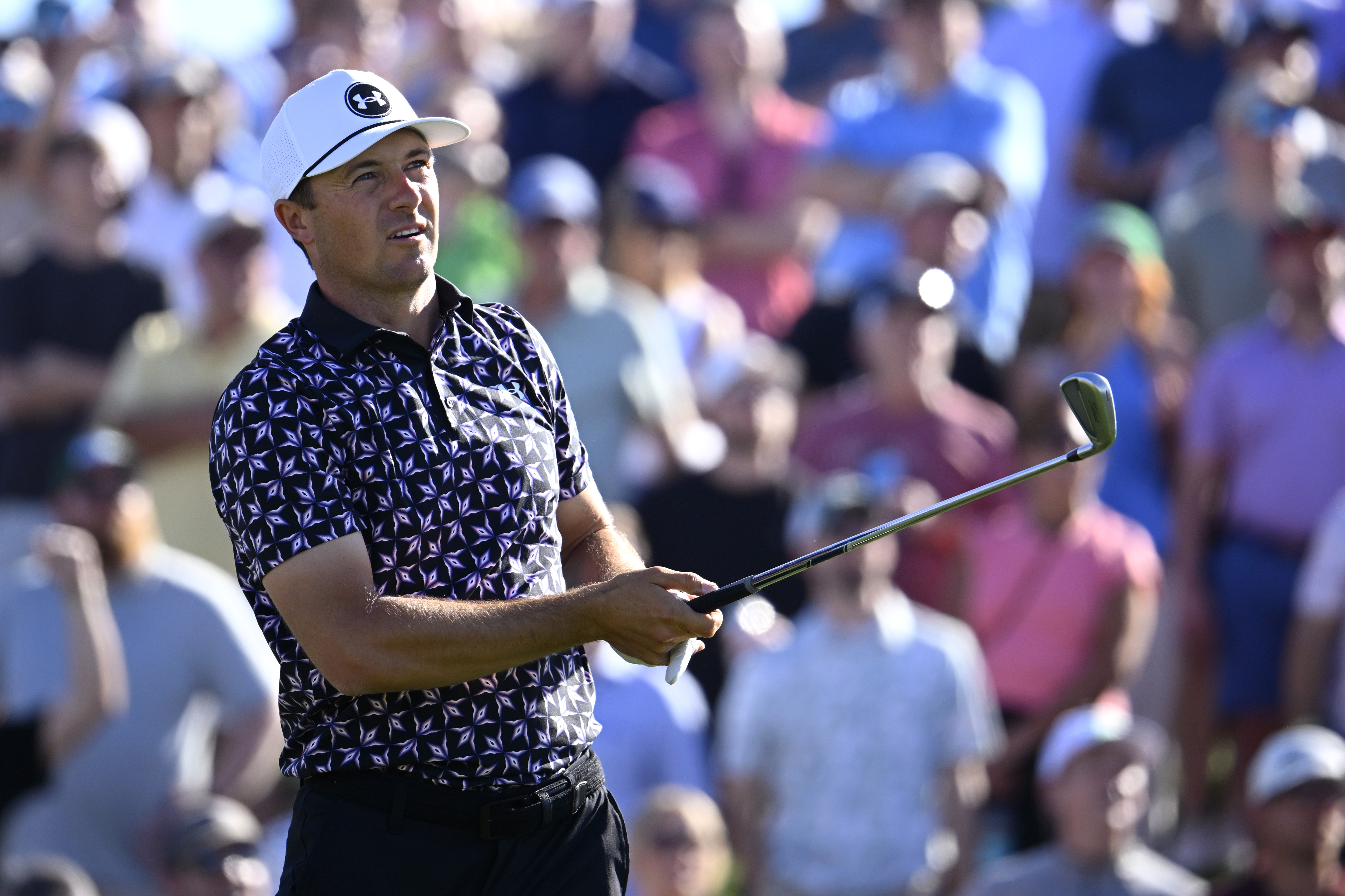 Jordan Spieth hits an iron off the tee