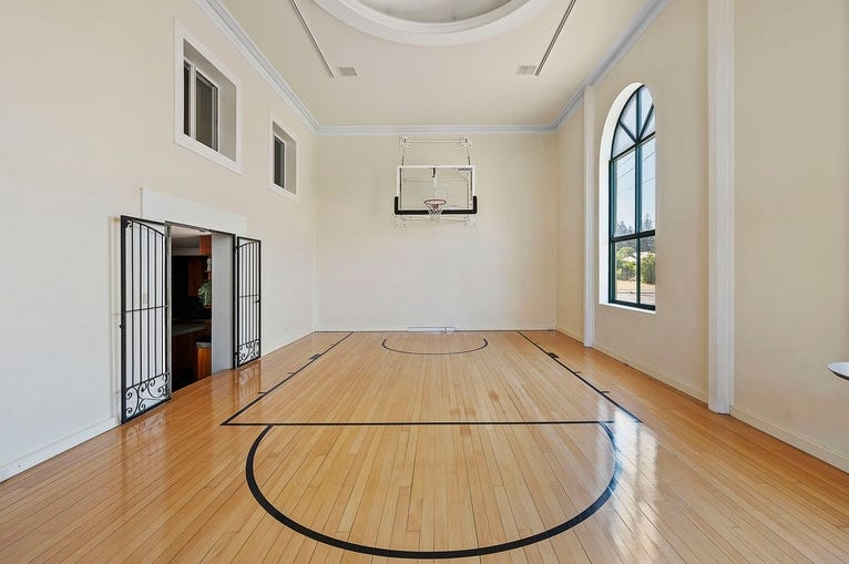 Slam dunk sale: Indoor basketball court seals deal on one-of-a-kind apartment