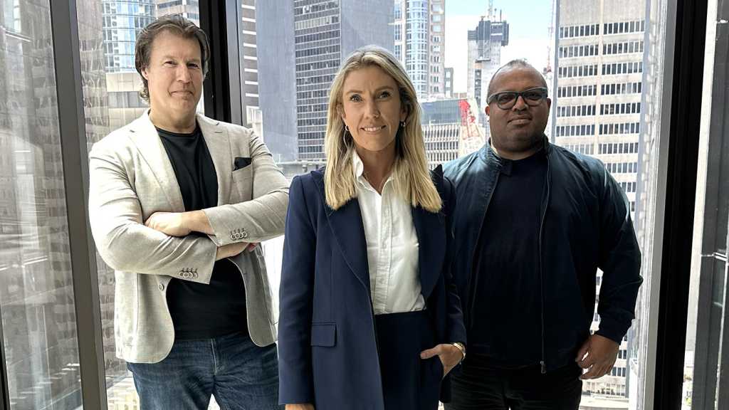 A photograph of V2 AI's, from left to right, Michael Ewald, Hannah Williams, and Peter Burns.