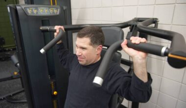 Salmon Arm Observer reporter Lachlan Labere is overcome with constipated face while nearing the end of a rep on the chest/incline/shoulder press machine at the newly renovated and equipped gym in the SASCU Recreation Centre on Friday, Feb. 13, 2026. (Leith Labere photo)