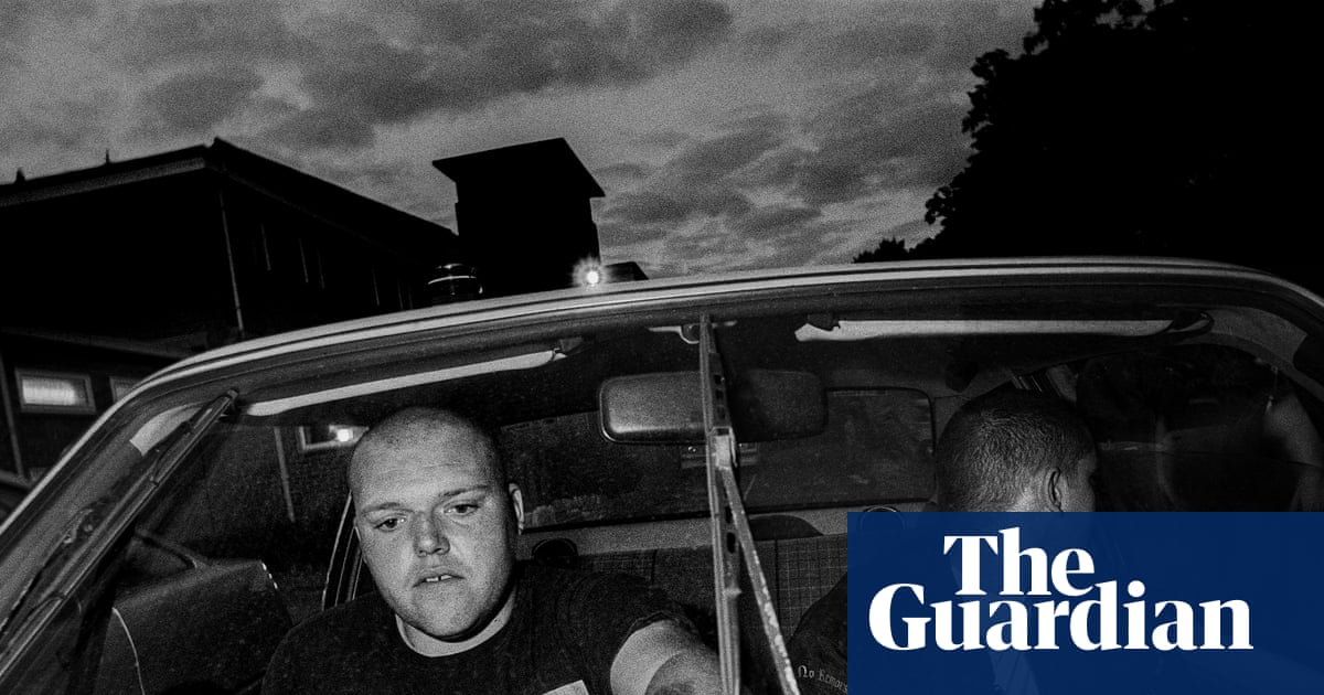 Two skinheads counting the takings from a neo-Nazi gig: Leo Regan’s best photograph | Art and design