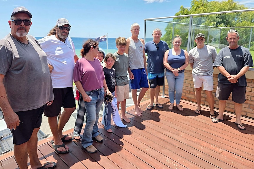 The Appelbee family stands with Busselton and Naturaliste Marine Rescue volunteers.