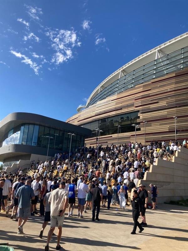 Fans were stuck outside the Perth stadium as they faced issues with their digital tickets. 
