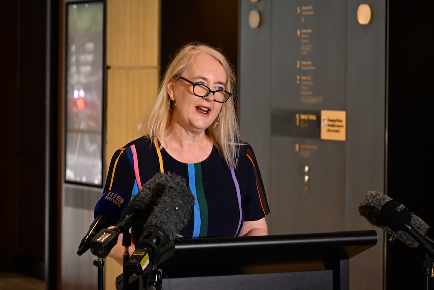 Rachel Healy speaking at a press conference.