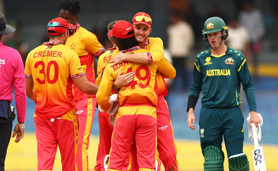 Zimbabwe players celebrate after their stunning win over Australia.
