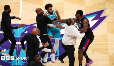 Charlotte Hornets forward Miles Bridges has an altercation with the Detroit Pistons' Jalen Duren