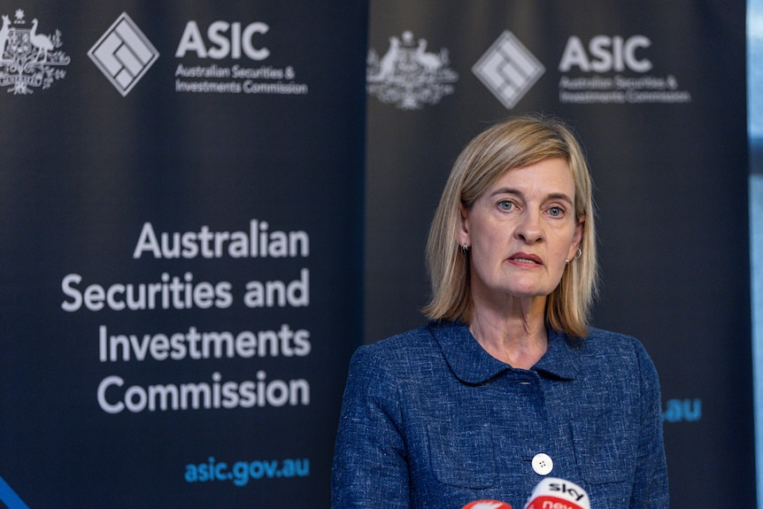 Sarah Court in front of ASIC logo