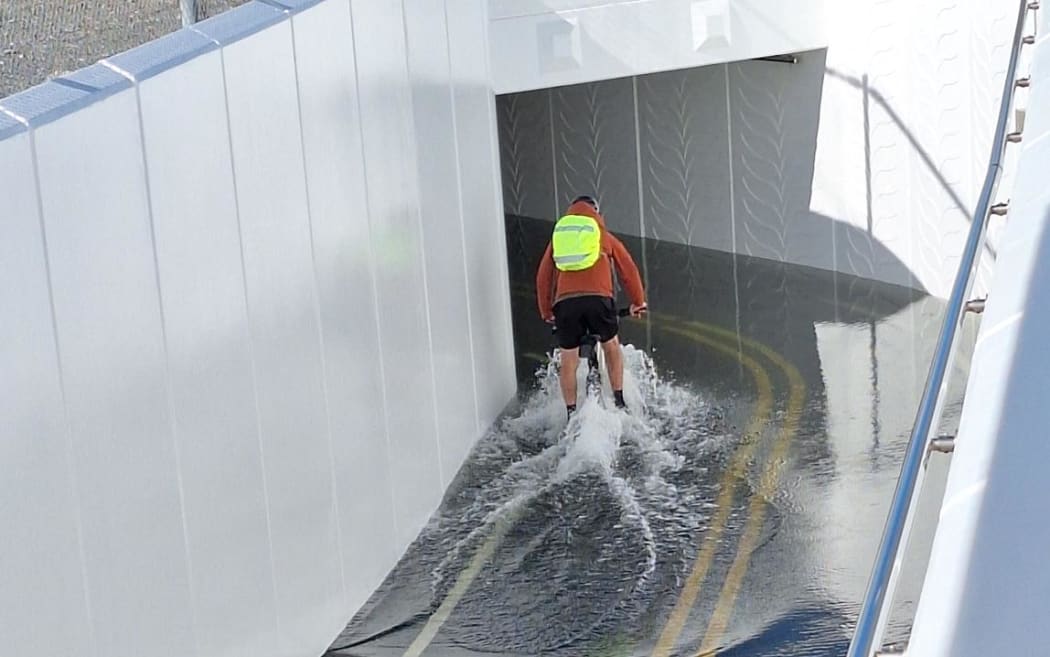 The flooded Petone railway underpass on the nearly-new $70 million cycleway.