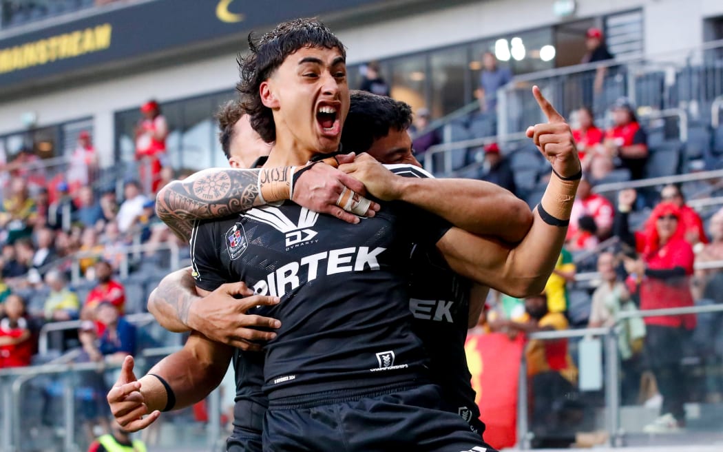 Casey McLean celebrates with teammates after scoring. New Zealand Kiwis v PNG, Pacific Championships rugby league test match at CommBank Stadium, Sydney, Australia on Sunday 10th November 2024. © Photo: David Neilson / Photosport