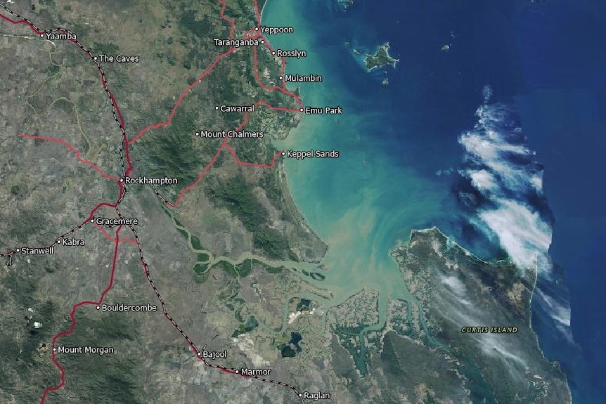 A satellite/map view of discolored water leaving ribbons of waterways into the ocean