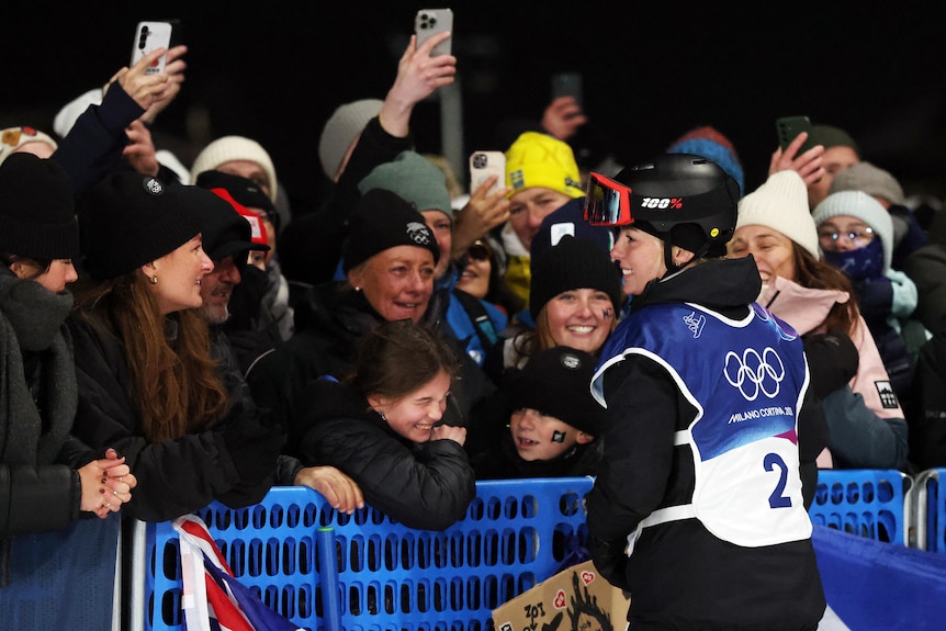 Zoi Sadowski Synnott with her supporters after the Winter Olympics snowboard big air final.
