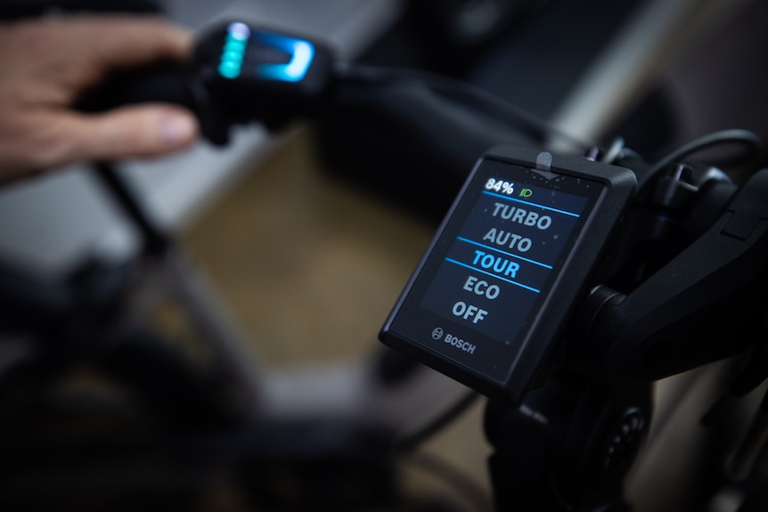 A display monitor on the handlebars of an e-bike