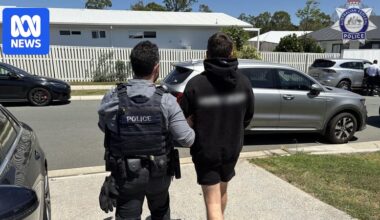 Man faces court charged with possessing extremist material after phone search at Brisbane Airport