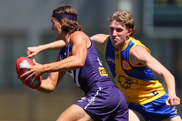 Rising star winner Murphy Reid looks to evade last year’s No.1 draft pick, Willem Duursma.