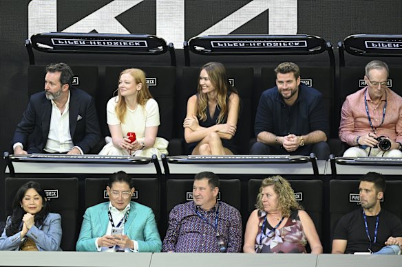 Top row (from left) Actors Dave Lawson and Sara Snook Gabriella Brooks and her partner Hollywood actor Liam Hemsworth enjoy VIP seating at the Open.