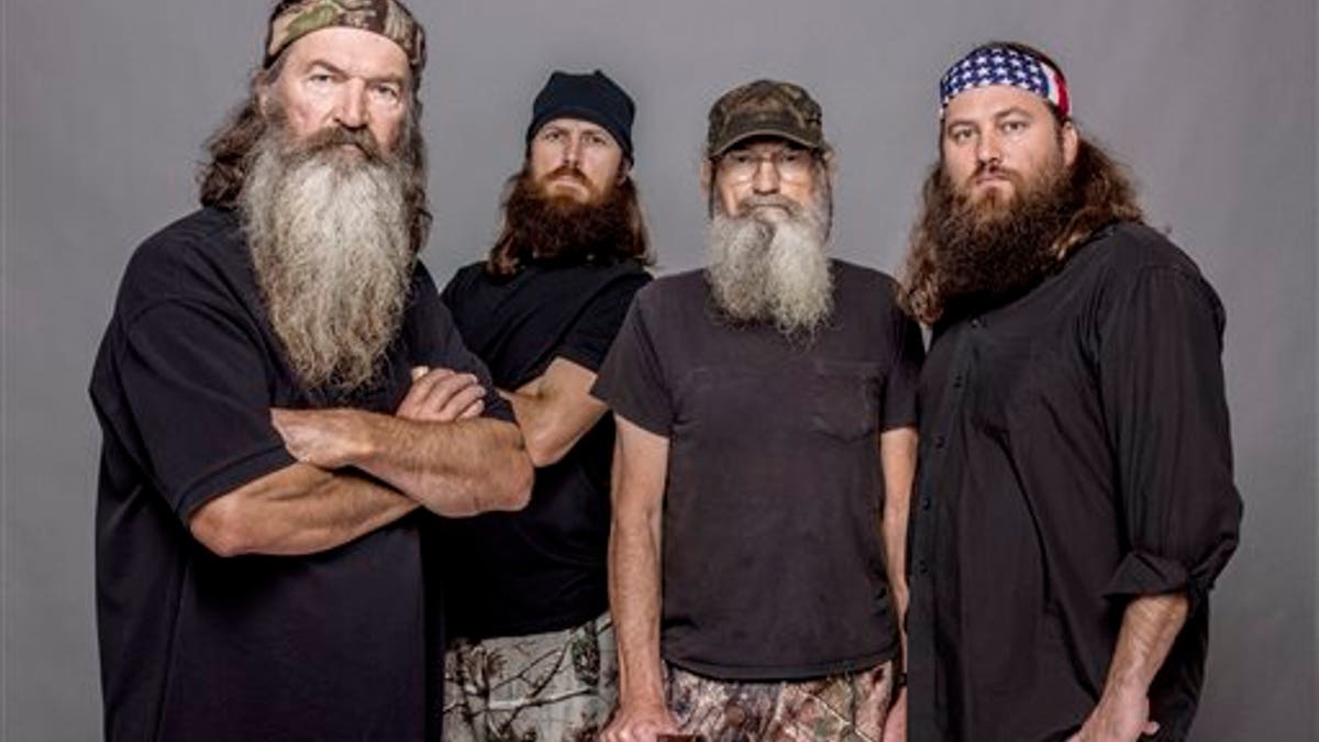 This 2012 photo released by A&E shows, from left, Phil Robertson, Jase Robertson, Si Robertson and Willie Robertson from the A&E series, "Duck Dynasty," airing Wednesdays at 10 p.m. EST. (AP Photo/A&E, Zach Dilgard)