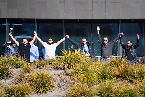 Al Noor Mosque shooting survivors (from left) Mustafa Boztas, Wasseim Alsati and Temel Atacocugu  celebrating after Tarrant’s 2020 sentencing.