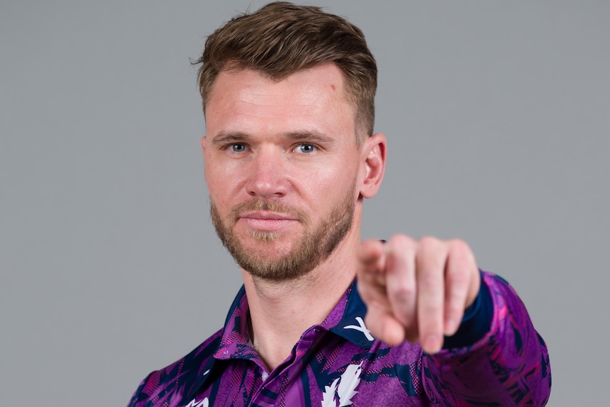 Richie Berrington points with his left hand