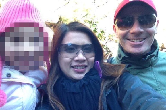 Sutasinee McGuigan (centre) and husband Patrick McGuigan. 