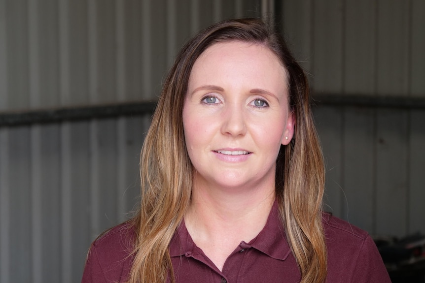 Close-up of woman staring at camera.