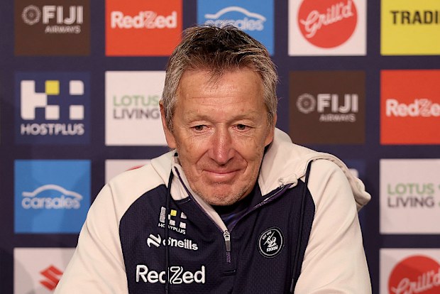 Coach Craig Bellamy speaks to media.