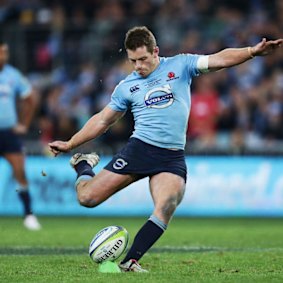 The winning goal: Bernard Foley kicks the winning penalty goal in the Super Rugby final against the Crusaders at ANZ Stadium.