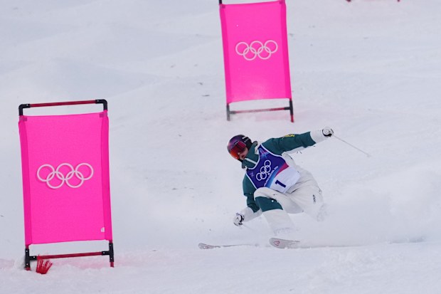Australia's Jakara Anthony stumbles during the women's freestyle skiing moguls finals at the 2026 Winter Olympics, in Livigno, Italy, Wednesday, Feb. 11, 2026. (AP Photo/Lindsey Wasson)