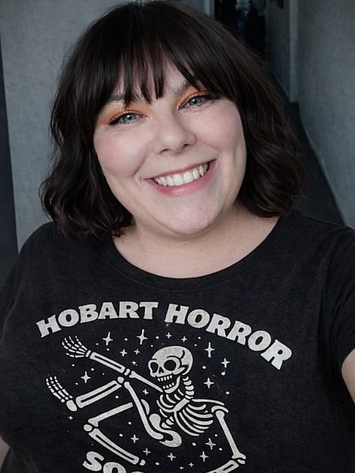 Courtney Tembry smiles at the camera.