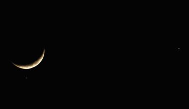 A waxing crescent moon is shown to the left of a photo of a black night sky, with one bright star-like object directly below its disk and another to the far right of the screen.