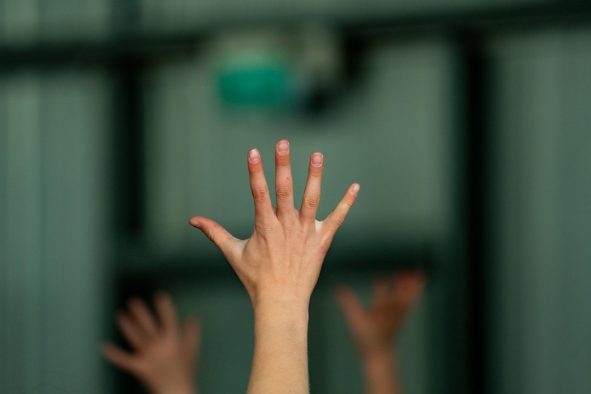 An outstretched hand.