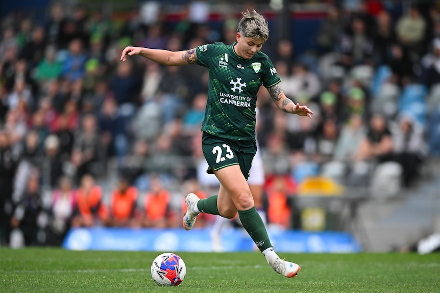 Michelle Heyman of Canberra United is preparing to kick the football during a match