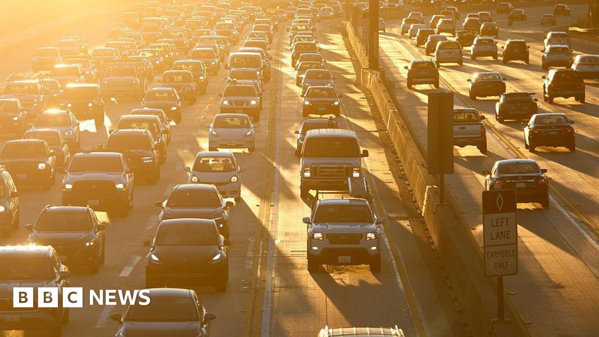 Traffic backs up on Interstate 405 during the morning commute at sunrise on January 15, 2026 in Los Angeles, California