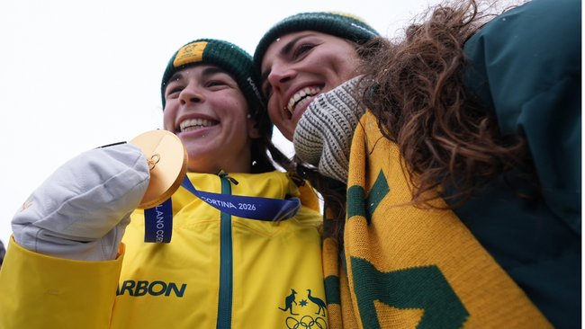 Jakara Anthony celebrates her dual moguls gold medal with Jess Fox.