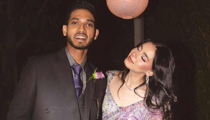 Rapper Talha Anjum (right) and his fiancee Zoiea Karim pose for a picture after their ring ceremony. — Instagram/@Talhaanjum